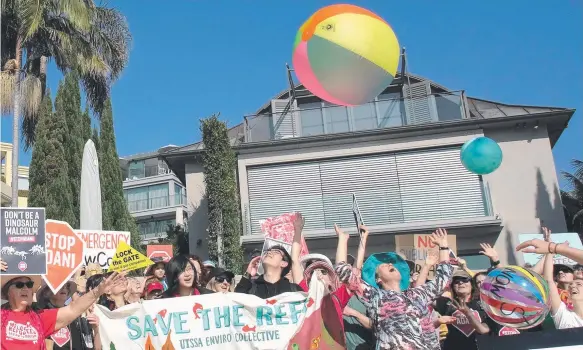  ?? Picture: AAP IMAGE ?? Anti-mining protesters outside Prime Minister Malcolm Turnbull's Sydney home to rally against taxpayer funding for the Adani coal mine.