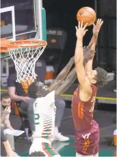  ?? WILFREDO LEE/ASSOCIATED PRESS FILE ?? A coach had to convince Keve Aluma, right, to play high school basketball. Now, he’s Virginia Tech’s leading scorer and rebounder.