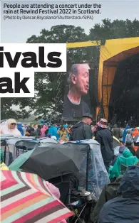  ?? (Photo by Duncan Bryceland/Shuttersto­ck/SIPA) ?? People are attending a concert under the rain at Rewind Festival 2022 in Scotland.