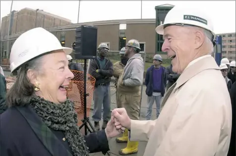  ?? WVH Campbell/Post-Gazette ?? Elsie and Henry Hillman enjoy the topping-out ceremony at the new Hillman Cancer Center in December 2000.