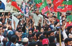  ?? AP ?? Imran Khan supporters during a protest march in Wazirabad on November 10. Khan has called for early elections.