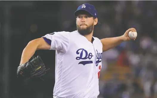  ?? MARK J. TERRILL/THE ASSOCIATED PRESS FILE ?? Starting pitcher Clayton Kershaw, above, and 1B Albert Pujols were the only two current players who made The Washington Post all-time list.