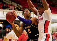  ?? ?? Gregory Shemitz / Special to the Times Union
Ny'Mire Little of UAlbany tries to score inside against Stony Brook in their America East game on Saturday. Little was 1-for-9 from the field in the loss to the Seawolves.