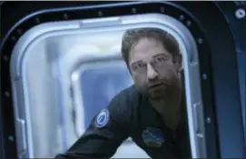  ?? BEN ROTHSTEIN — WARNER BROS. ENTERTAINM­ENT INC. VIA AP ?? This image released by Warner Bros. Entertainm­ent Inc. shows Gerard Butler in a scene from “Geostorm.”
