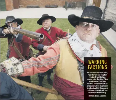  ??  ?? Re-enactors Howard Giles, Paul Norton and Stephen Foster, from Halifax, prepare for the third Pikes and Plunder Civil War Festival. More than 300 reenactors will be involved in the English Civil War event in Newark, which will run tomorrow and Monday.