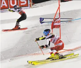  ?? Jonas Ericsson / Agence Zoom / Getty Images ?? American Mikaela Shiffrin (foreground) outperform­s Austria’s Katharina Truppe in a parallel city slalom event in Stockholm.