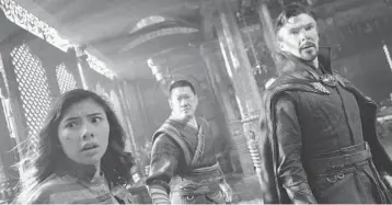  ?? MARVEL STUDIOS ?? Xochitl Gomez, from left, as America Chavez, Benedict Wong as Wong, and Benedict Cumberbatc­h as Dr. Stephen Strange star in “Doctor Strange in the Multiverse of Madness.”