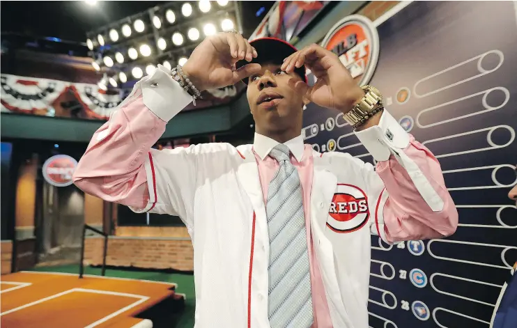  ?? — AP ?? Hunter Greene, a pitcher and shortstop from Notre Dame High School in Sherman Oaks, Calif., smiles after being selected No. 2 by the Cincinnati Reds Monday.