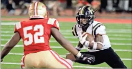  ?? Jeremy Stewart ?? Rockmart’s JoJo Haynes (right) looks to get past Rome High’s Jyrine Griffin (52) while making a run during the fourth quarter of Friday’s game at Barron Stadium in Rome.