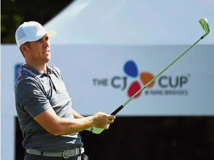  ?? — AFP ?? Moving up: American Luke List watching his ball after teeing off on the first hole during the second round of the CJ Cup in Jeju Island yesterday.