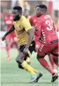  ??  ?? BATTLE: Mwape Musonda and Sello Motsepe fight for the ball yesterday.