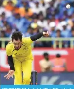  ?? —AFP ?? VISAKHAPAT­NAM: Australia’s Mitchell Starc bowls during the second one-day internatio­nal (ODI) cricket match between India and Australia on March 19, 2023.