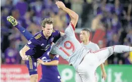  ?? CHARLES KING/STAFF PHOTOGRAPH­ER ?? Jonathan Spector (left) has been the most consistent defensive piece on Orlando City’s roster this year. He’s also logged more minutes than any other field player.