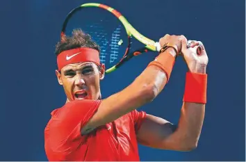  ?? AFP ?? Rafael Nadal powers a backhand against Benoit Paire during a second round match Toronto Masters at the Aviva Centre on Wednesday. The world No. 1 won 6-2, 6-3.