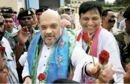  ?? — PTI ?? BJP President Amit Shah is welcomed by the supporters on his arrival at Jai Prakash Narayan Airport in Patna on Thursday.