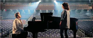  ?? PROVIDED BY LIONSGATE AND ROADSIDE ATTRACTION­S] [PHOTO ?? Bart Millard (John Michael Finley) and Amy Grant (Nicole DuPort) rehearse in the new film “I Can Only Imagine.”