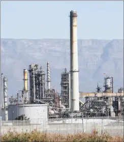  ?? PHOTO: EPA ?? The Chevron Oil Refinery in Cape Town. The energy sector certainly has one clear driver – the price of oil. By using sub-sectors as tools, managers can then either desensitis­e a portfolio when they believe the oil price is heading lower or increase...