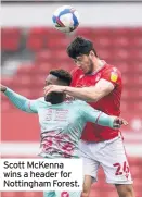  ??  ?? Scott Mckenna wins a header for Nottingham Forest.