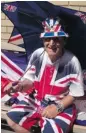  ?? MATTHEW FISHER/POSTMEDIA NEWS ?? The ‘Union Jack Man,’ as Terry Hutt styles himself, has camped out across the street from where the Duchess of Cambridge is to give birth any day now.