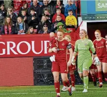  ?? ?? Hannah Stewart leads the team out at Pittodrie.