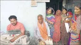  ??  ?? Villagers gather at the residence of Amarjeet, who lost all his three children in Thursday’s accident, in Kushinagar on Friday. DEEPAK GUPTA/HT