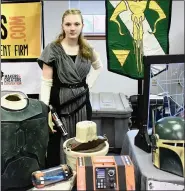  ??  ?? Dressed as Star Wars’ Rey, Sarah Sacks, 13, poses at the Mav Oya’la clan of the Mandaloria­n Mercs Costume Club’s table at the Boyertown Library Comic Con.