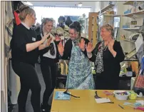  ??  ?? Mary’s Meals volunteers practising the shuffle.