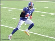  ?? Bill Kostroun / Associated Press ?? Giants free safety Logan Ryan warms up before a game against the Cardinals on Dec. 13.