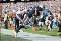  ?? Michael Dwyer ?? The Associated Press Patriots wide receiver Brandin Cooks drags a foot as he makes the game-winning catch Sunday against the Texans.