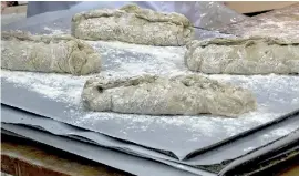  ??  ?? The first mass-delivered bread made of insects are seen at the Finnish food company Fazer bakery in Helsinki, Finland. Reuters/Attila Cser