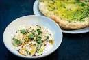  ?? CONTRIBUTE­D BY HENRI HOLLIS ?? Creamy stracciate­lla is served with a freshly baked flatbread at No. 246 in Decatur.
