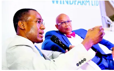  ?? RUDOLPH BROWN/PHOTOGRAPH­ER ?? Dr Nigel Clarke (left), minister of finance and the public service, speaking with Christophe­r Berry, chairman of Mayberry Investment­s Limited at the Wigton IPO briefing at The Jamaica Pegasus hotel, New Kingston, on Tuesday.