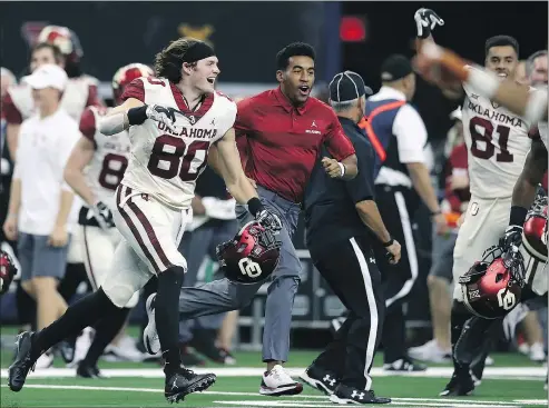  ?? — GETTY IMAGES ?? The Oklahoma Sooners beat the Texas Longhorns 39-27 on Saturday to win the Big 12 Championsh­ip.