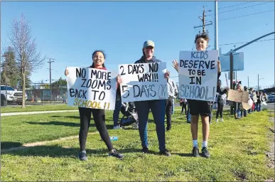  ?? Courtesy photo ?? Families gathered to rally for Marysville Joint Unified School District schools to fully reopen for in-person instructio­n five days per week on Tuesday.