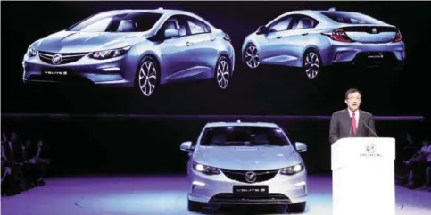  ??  ?? SHANGHAI: SAIC-GM president Wang Yongping announces the global launch of the Buick Velite 5, an extended range electric hybrid, during a global launch event ahead of the Shanghai Auto 2017 show in Shanghai, China.—AP