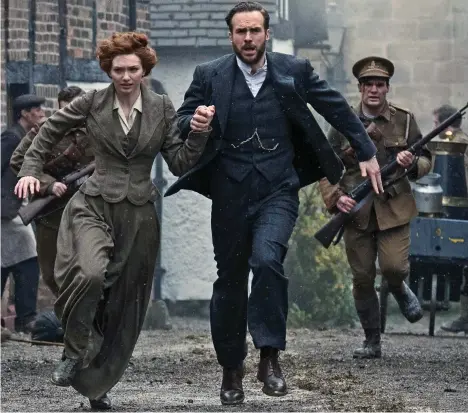  ??  ?? Lovers under fire: Eleanor Tomlinson as Amy and Rafe Spall as George in BBC1’s The War Of The Worlds