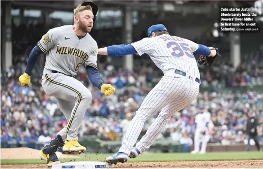  ?? QUINN HARRIS/AP ?? Cubs starter Justin Steele barely beats the Brewers’ Owen Miller to first base for an out Saturday.
