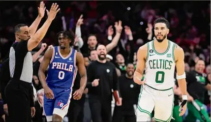  ?? Matt Slocum / Associated Press ?? The Celtics’ Jayson Tatum gestures after scoring during the second half of Game 6 of the Eastern Conference semifinals against the Philadelph­ia 76ers on Thursday in Philadelph­ia.