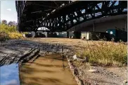  ?? COREY SIPKIN / AP ?? Dumpsters are stored on the site of a former landfill under the Pulaski Skyway in Jersey City, N.J., on Friday. The site is being investigat­ed by the FBI as the possible location of the remains of Jimmy Hoffa.