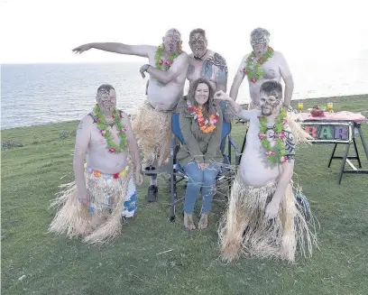  ??  ?? The men’s shed group posed for a calendar