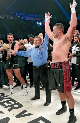  ?? PHOTO: PHOTOSPORT ?? This was the defining moment from the WBO world title fight in Manchester as the decision favouring Joseph Parker is announced. The relief from Parker, right, contrasts sharply with the anger evident from Hughie Fury, left.