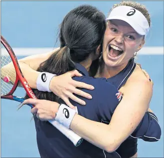  ?? ?? Harriet Dart celebrates singles victory in Glasgow yesterday with captain Anne Keothavong. But, ultimately, Great Britain came up just short