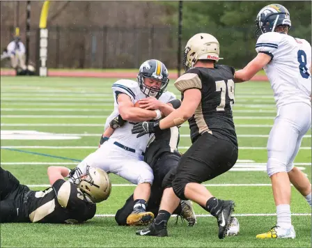  ?? Photo by Michael Derr / The Independen­t ?? The Burrillvil­le football team warmed up for next weekend’s regular-season division title game against Cumberland with a 20-0 road defeat to North Kingstown of the Power Four. The defeat drops the Broncos to 2-2 overall and 2-1 in Division I.