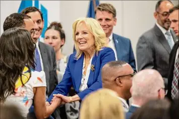  ?? Chris Granger / Associated Press ?? First lady Jill Biden visits the Louisiana Cancer Research Center Friday to stress the importance of cancer research.