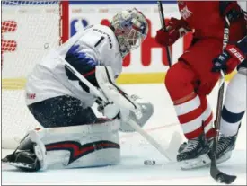  ?? THE ASSOCIATED PRESS ?? Keith Kinkaid of the United States makes a save during the Ice Hockey World Championsh­ips group B match between Denmark and United States at the Jyske Bank Boxen arena in Herning, Denmark, Saturday.