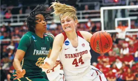  ?? Scott Strazzante / The Chronicle ?? Stanford’s Karlie Samuelson, who had 11 points and six rebounds, drives past USF’s Claudia Price in the second quarter.