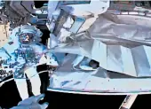  ?? NASA ?? This photo shows the view from NASA’s Andrew Morgan’s helmet cam as Italian astronaut Luca Parmitano works outside the space station during a spacewalk Saturday.