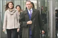  ?? Erik Trautmann / Hearst Connecticu­t Media ?? Michelle Troconis, charged with conspiracy to commit murder in the disappeara­nce of Jennifer Dulos, exits the court following a pretrial hearing with her family and attorney Jon L. Schoenhorn in February.