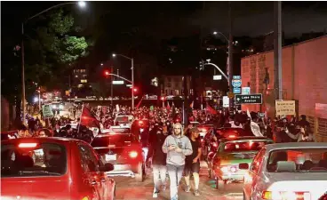  ??  ?? Tension mounts:
Protesters marching to block traffic during a rally in response to the Charlottes­ville car attack. — Reuters