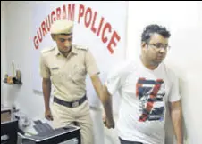  ?? PARVEEN KUMAR/HT PHOTO ?? Accused Kedarnath Sagar Sharma (right), was arrested on Sunday after one of the people he took ₹lakh from for an EWS flat lodged a complaint on Saturday.